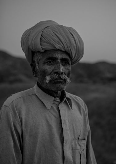 Black and White Photography with the title 'India 8'. Portrait of an Indian man with a turban.