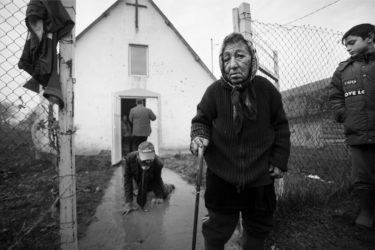 Roma church visitors camp Sanislau - black and white portrait photography by Will Falize - friendmade.fm